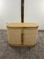 Anthropologie Sienna oak wood entryway cabinet with woven rattan doors open