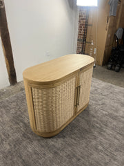 Rear angle of the Anthropologie Sienna oak wood entryway cabinet