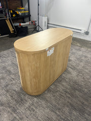 Rear view of the Anthropologie Sienna oak wood entryway cabinet