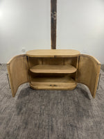 Alternate angle of the Anthropologie Sienna oak wood entryway cabinet