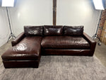 Restoration Hardware Maxwell espresso brown leather sectional sofa shown from the front angle