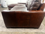 Close-up view of the espresso brown Italian aniline leather sectional sofa