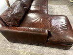 Rear view of the espresso brown leather sectional sofa