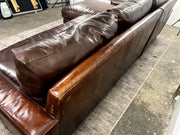 Rear angle of the espresso brown leather sectional sofa